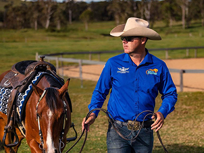 Chris Gould leading a horse